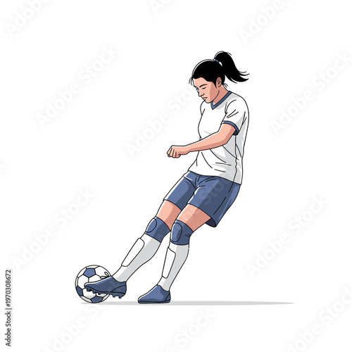 Female soccer player kicking a ball