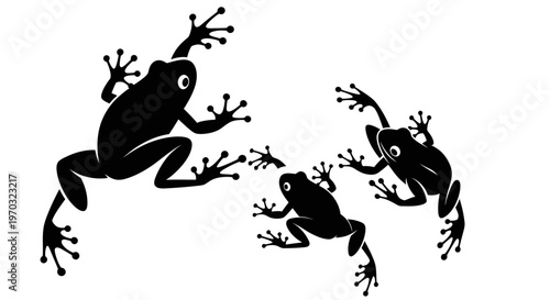 Three Black Frogs Silhouettes Jumping and Climbing.