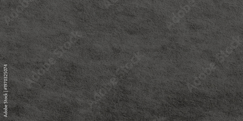 A dark, textured backdrop featuring a seamless blend of black leather, fabric, and canvas materials with a rough, vintage grunge pattern on a blank surface