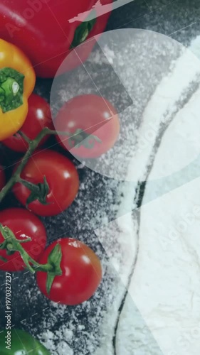 Vertical video: Camera panning down showing produce on flour, % overlays tagging for food testing
