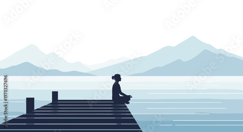 A dark silhouette of a person is meditating in a lotus pose on a wooden pier by a calm lake with layered blue mountains in the background.