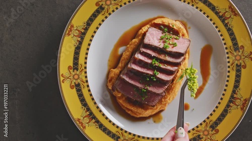 Wallpaper Mural Chef garnishes a plated NY strip steak with fresh herbs and chives using tweezers. Torontodigital.ca