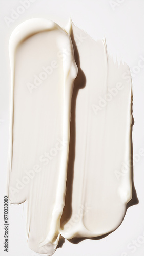 Cuadro en lienzo Thick cosmetic cream smeared in vertical strokes on white background