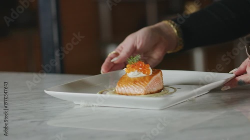 Wallpaper Mural Plated salmon dish garnished with dill and roe, served on a white plate. Torontodigital.ca