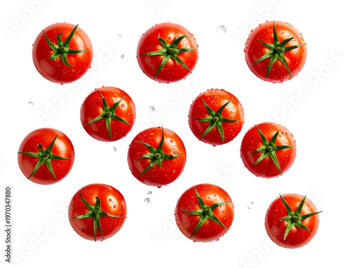 Fresh red tomatoes falling with water droplets