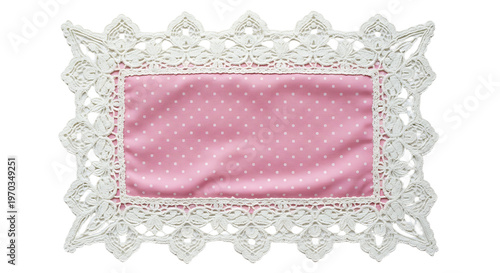 Pink fabric with white polka dots in a white lace doily isolated on transparent background