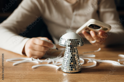 Handmade disco mushroom decor with mirror tiles, trendy shiny home decoration.