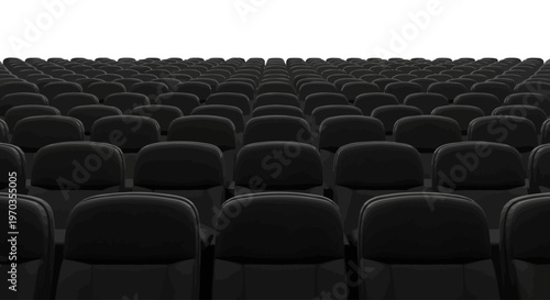 Rows of dark, empty cinema seats await an audience in a spacious theater setting, highlighting the anticipation of a forthcoming event or performance