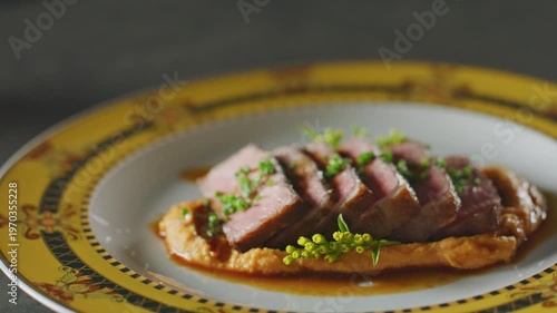 Wallpaper Mural Sliced New York strip steak with herbs and sauce on a decorative plate. Torontodigital.ca
