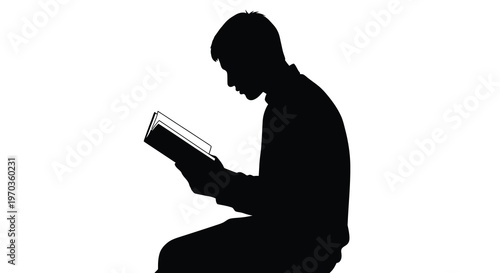 A person deeply engrossed in reading a book black silhouette
