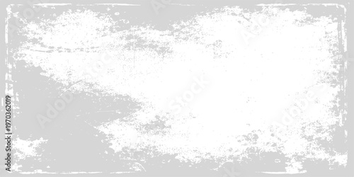 Abstract grunge background featuring a vintage black ink splatter pattern and a decorative floral border frame with empty space for a textured paper design