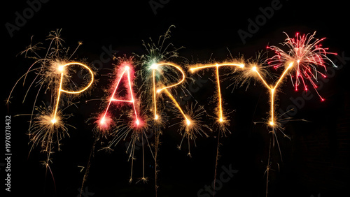 Festive horizontal composition displaying word party written with burning sparklers emitting golden trails multicolored light bursts fiery glowing embers against dark black night sky background
