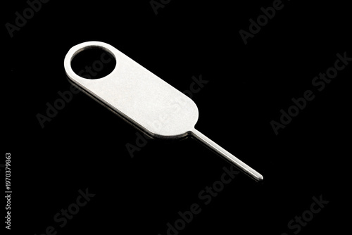 Tool for eject SIM card phone isolated on white background