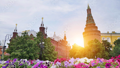 Moscow Red Square with State Historical Museum, Kremlin tower, and vibrant flowers