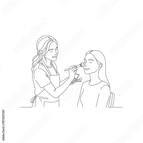 Woman getting makeup applied to face.