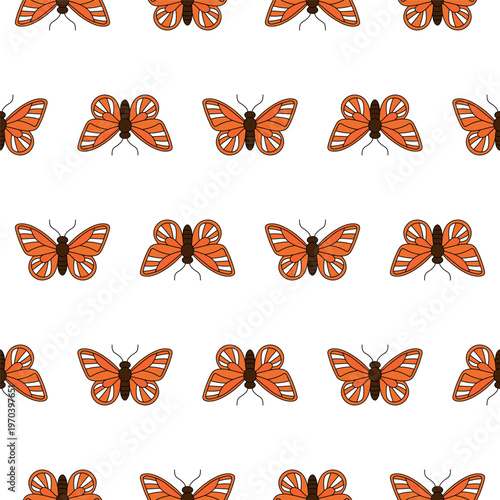 Butterflies in a repeat pattern on a simple background with no clutter or distractions showing symmetry in design