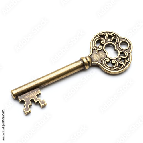 Antique brass key isolated on white background