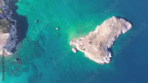 Aerial drone shot.View of famous beach in the summer, Crete, Greece. Famous beach with river and palm trees in Libyan sea. Tropical island, Panoramic view, Most beautiful beaches of Crete island