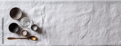 Wide Shot Flat Lay Linen Cloth Glass Mister Small Pots Negative