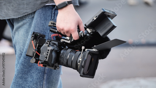 Fotografie Handheld camera rig filming video production with professional cinematography ge