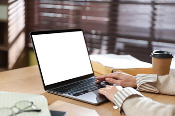 Papier peint photo  Woman working with laptop at wooden table indoors, closeup  © New Africa