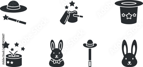 A collection of black and white magic icons and symbols on a plain background