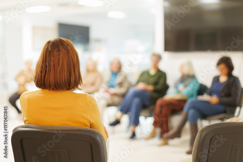 Women gather in business meeting to discuss ideas and strategies in a modern office space
