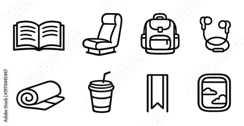 Travel and reading icons arranged in grid on dark gray background