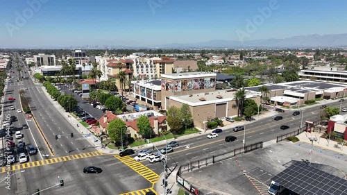 Downey, California, USA - Aerial View of Downtown Busy Streets and Hotels on Firestone Blvd on a Sunny Day