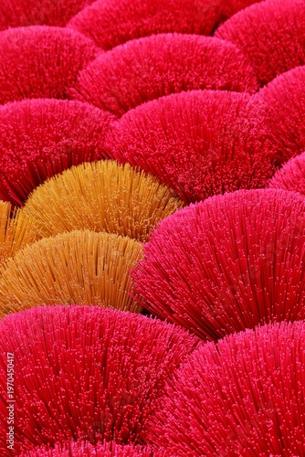 close up of pink and yellow striped paper