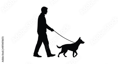 A man walks his dog along a path stark black silhouette