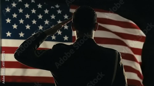 American soldier salutes flag.