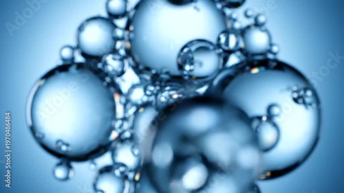 Blue transparent water bubbles floating freely.