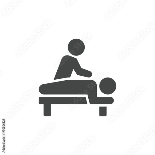 Simple black icon depicting a person receiving a massage treatment