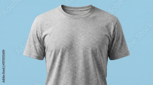 Heather grey crew neck t-shirt mockup on light blue background with ghost mannequin effect. Blank cotton jersey top for apparel branding, merchandise design and ecommerce retail display.