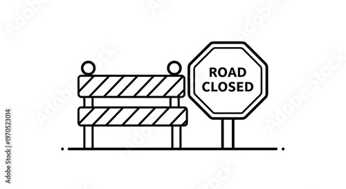 Road closed sign and barrier.