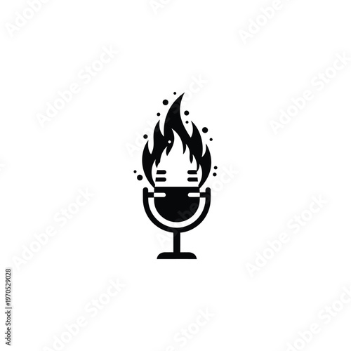 A flaming torch burns brightly on a pedestal indoors.