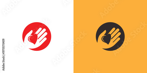 Hand holding a heart logo charity care love and support concept.