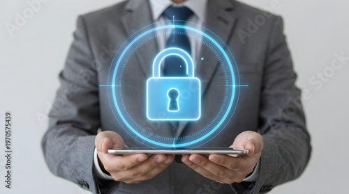 Business professional holding a tablet with a glowing padlock icon, symbolizing advanced digital security, robust data protection, and comprehensive cybersecurity measures