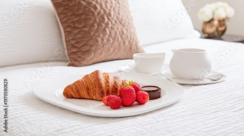Breakfast in Bed with Croissant and Strawberries.