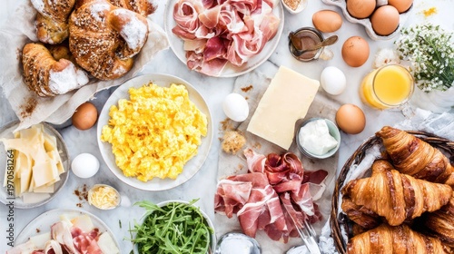 Breakfast Spread with Croissants and Ingredients.