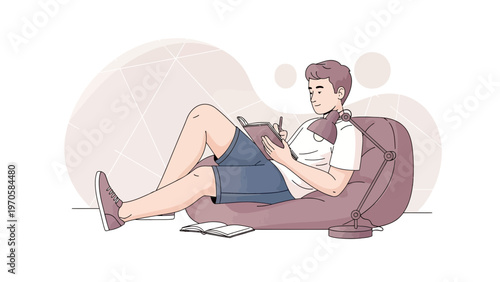 Young Man Relaxing on Beanbag Chair, Writing in Notebook, Studying or Journaling