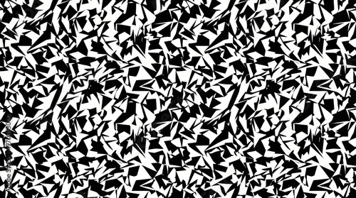 Black and white highcontrast chaotic geometric triangle pattern background.