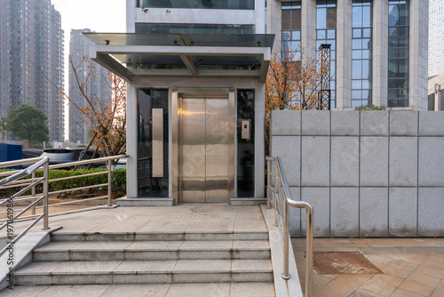 Elevators in modern city squares