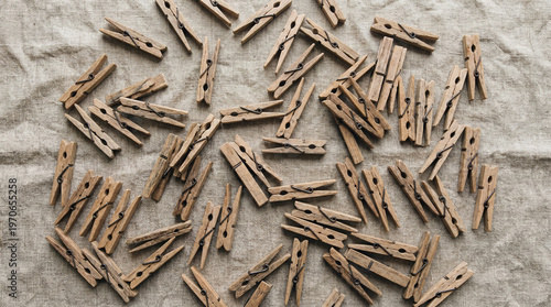 Wooden Clothespins on Linen.