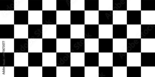 A black and white checkered pattern fills the frame