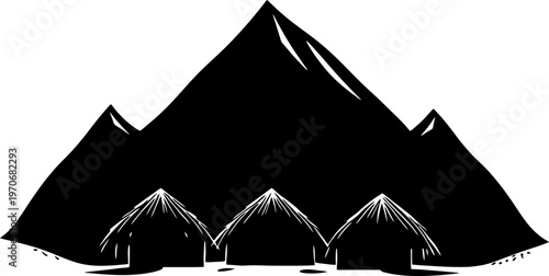 Silhouette of an Indigenous Village with Traditional Huts and High Mountains