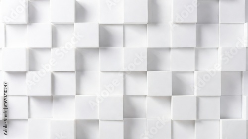 White geometric cubes forming layered relief on wall surface
