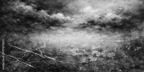 A moody black and white abstract of rain on a dark road under a stormy cloudscape with motion texture and fog