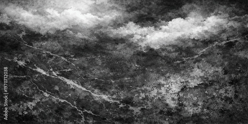 Abstract black and white cloudscape background featuring a dark stormy sky with dramatic smoke textures and white light fog
